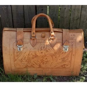 tooled leather duffle bag